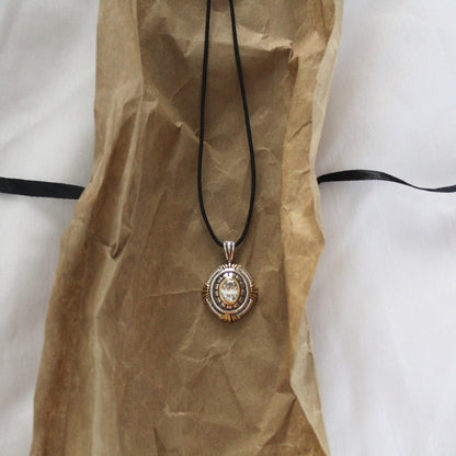 Mixed Metal Cord Pendant